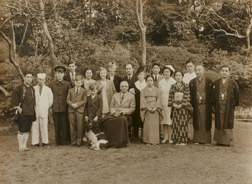The Fleisher family and household. Wilfrid standing in the center behind his father Ben sitting down.