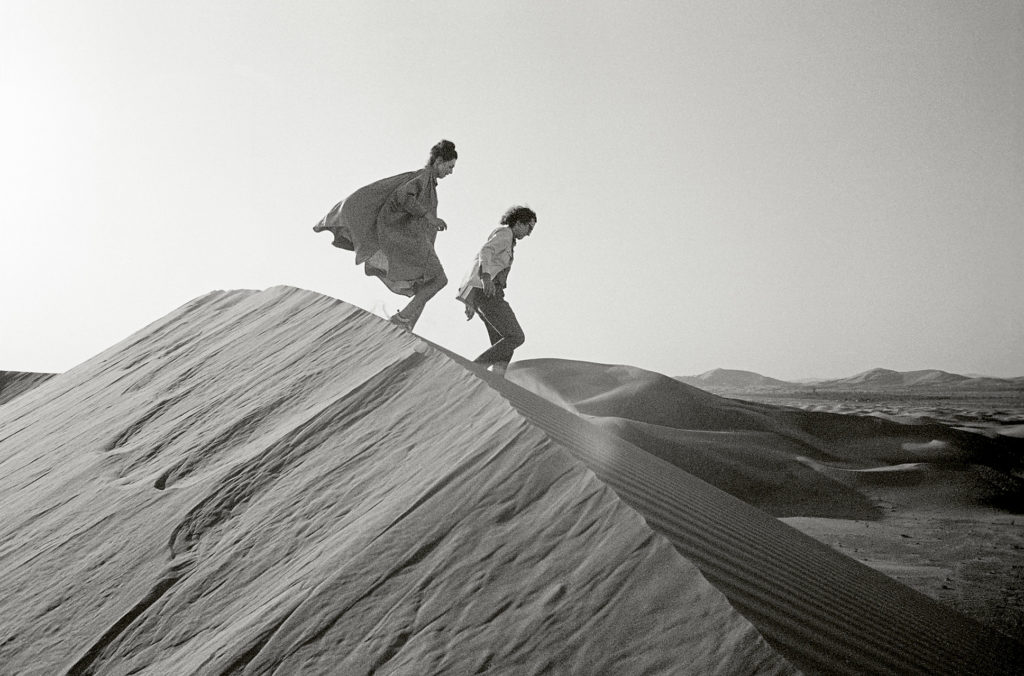 Christo and Jeanne-Claude looking for a possible site for The Mastaba. United Arab Emirates, February 1982.
Photo: Wolfgang Volz © 1982 Christo and Jeanne-Claude Foundation